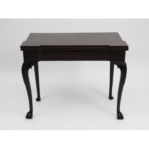 185 - An early - mid 18thC mahogany fold over card table with pad feet and ball and claw cabriole legs, on... 