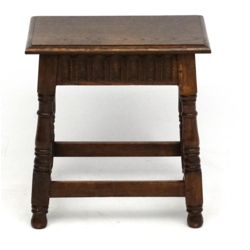 188A - An early- mid 20 thC Oak Joint stool in the Commonwealth style , made by Laverty , bears label under... 