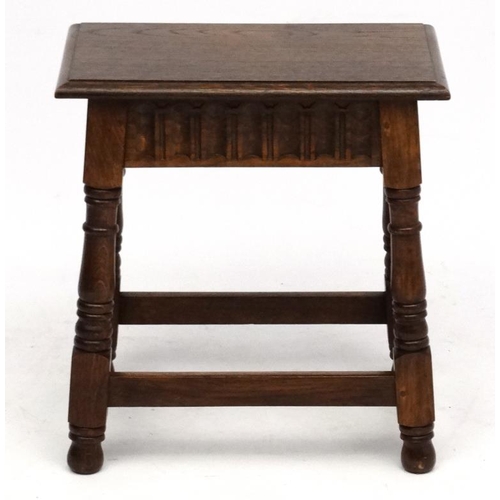 188A - An early- mid 20 thC Oak Joint stool in the Commonwealth style , made by Laverty , bears label under... 