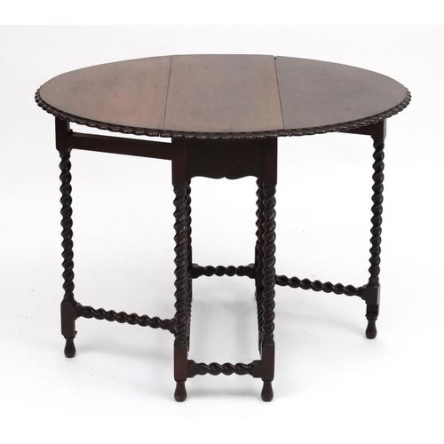 221 - A c.1900 small walnut barley twist oval gate leg table 24 3/4'' wide x 31 1/2'' long ( extended )