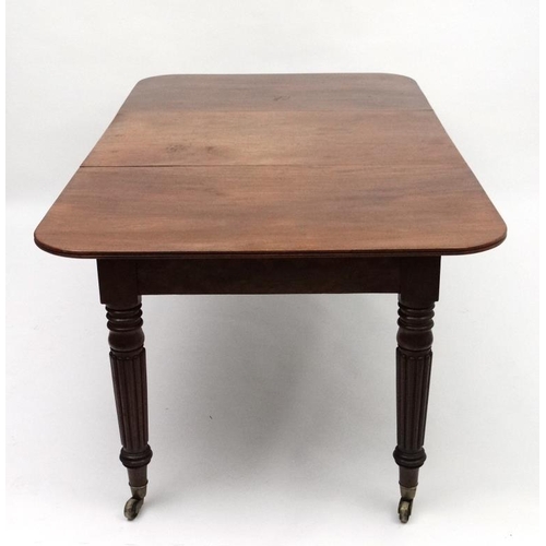 229 - An early 19thC mahogany pull out / drawer out extending dining table by J Cranston in the manner of ... 