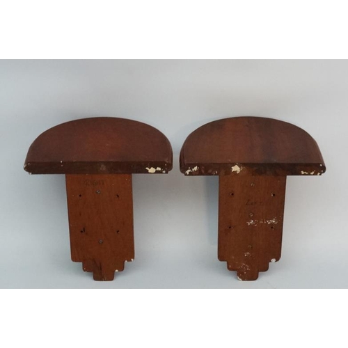 233 - A Pair of mahogany ? wooden clock brackets of supported demi-lune shape , measuring  13 1/2'' wide a... 