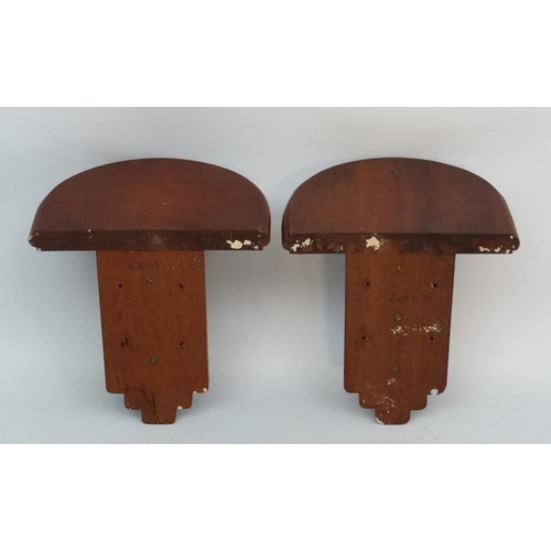 233 - A Pair of mahogany ? wooden clock brackets of supported demi-lune shape , measuring  13 1/2'' wide a... 