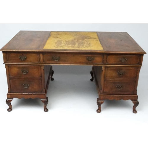 236 - A 1920's walnut twin pedestal writing desk with leather insert to top 36'' deep x 60'' wide x 29 1/2... 