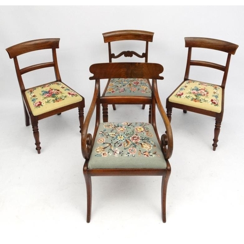 237 - A set of 4 Regency period mahogany and Rosewood dining chairs, including a carver chair with sabre l... 