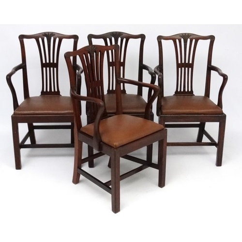 239 - A set of 4 18thC style mahogany dining chairs with carved wheat sheaf and rosette decoration and ope... 