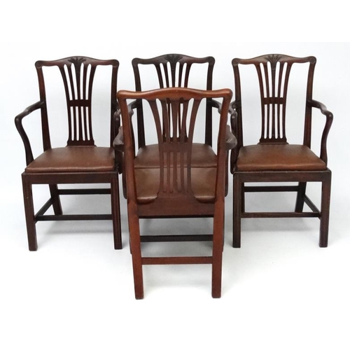 239 - A set of 4 18thC style mahogany dining chairs with carved wheat sheaf and rosette decoration and ope... 