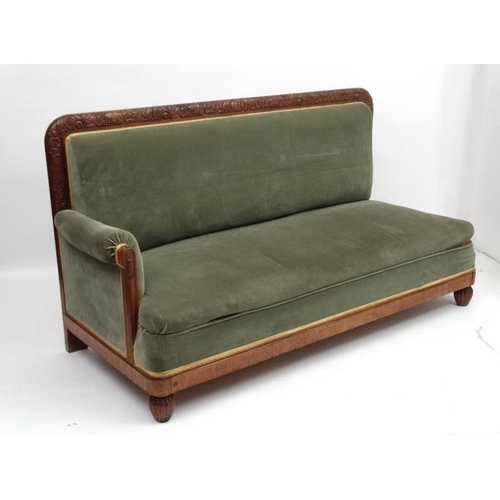 240 - Early 20thc Continental  ' Day-bed Sofa ' having a carved walnut showwood back surround etc. With sa... 