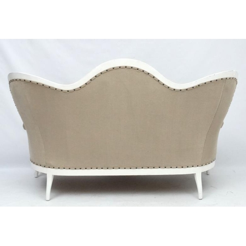 245 - A 19thC Continental shaped settee with white painted wooden frame and calico like upholstery. 68'' w... 