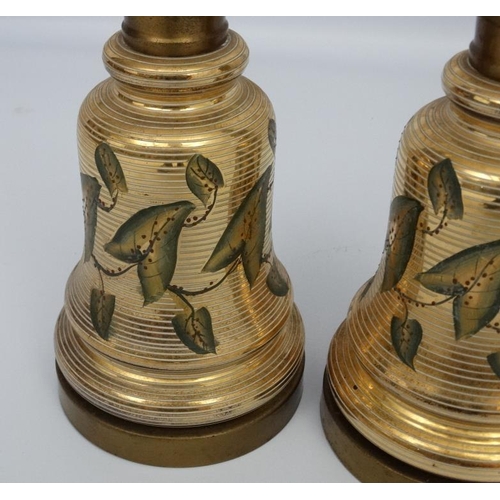 251 - A pair of early 20thC oil lamp conversions now formed as electric table lamps with gilded brass and ... 