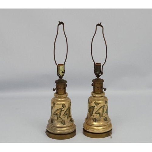 251 - A pair of early 20thC oil lamp conversions now formed as electric table lamps with gilded brass and ... 