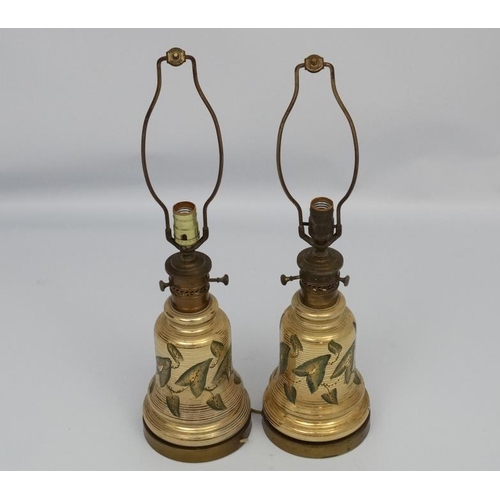 251 - A pair of early 20thC oil lamp conversions now formed as electric table lamps with gilded brass and ... 