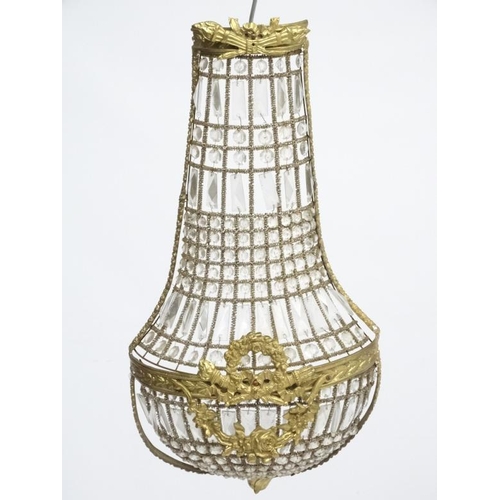 252 - A 20thC Continental Regency style glass luster wall shade of  basket shape. Approx 27'' high