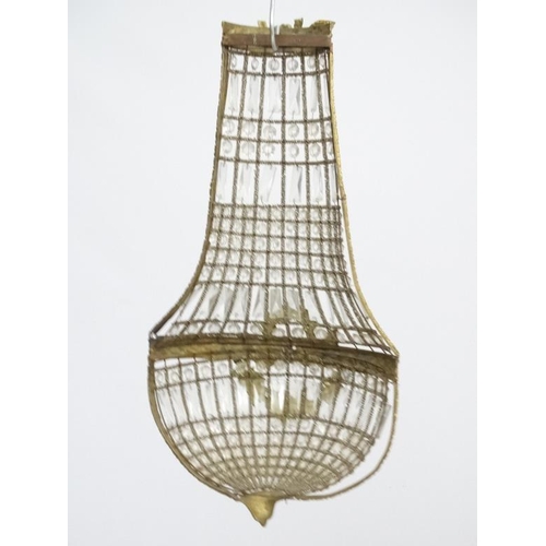 252 - A 20thC Continental Regency style glass luster wall shade of  basket shape. Approx 27'' high