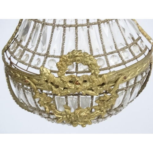 252 - A 20thC Continental Regency style glass luster wall shade of  basket shape. Approx 27'' high