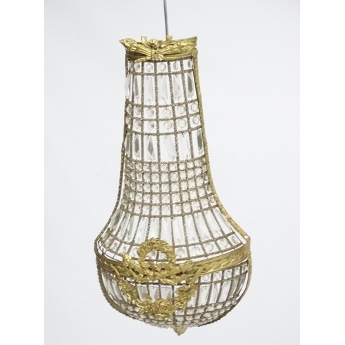 252 - A 20thC Continental Regency style glass luster wall shade of  basket shape. Approx 27'' high