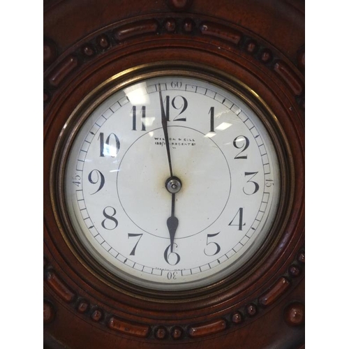 255 - Propeller Boss Clock : a mahogany cased barrel movement clock ( timepiece ) with platform escapement... 