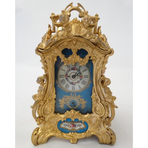 258 - Rococo Revival Ormolu Repeater Alarm Carriage Clock : a painted and gilded porcelain panelled ( in t... 