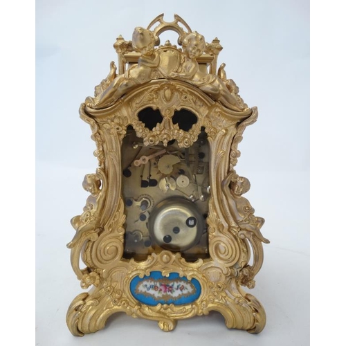 258 - Rococo Revival Ormolu Repeater Alarm Carriage Clock : a painted and gilded porcelain panelled ( in t... 