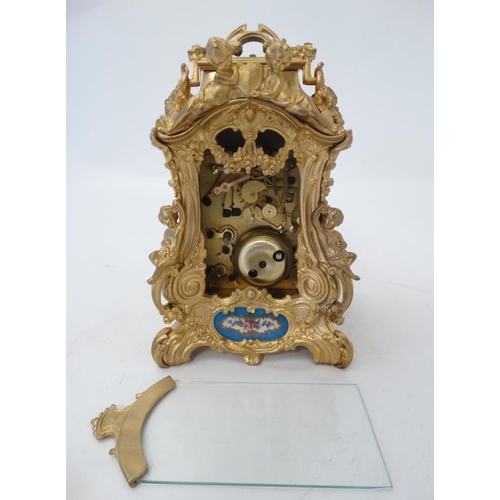 258 - Rococo Revival Ormolu Repeater Alarm Carriage Clock : a painted and gilded porcelain panelled ( in t... 