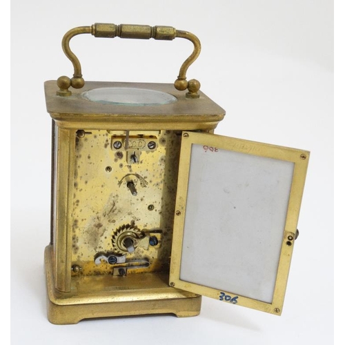 261 - Carriage Clock : a porcelain panelled 5 1/4'' high ( handle up) carriage clock ( timepiece ) with ov... 