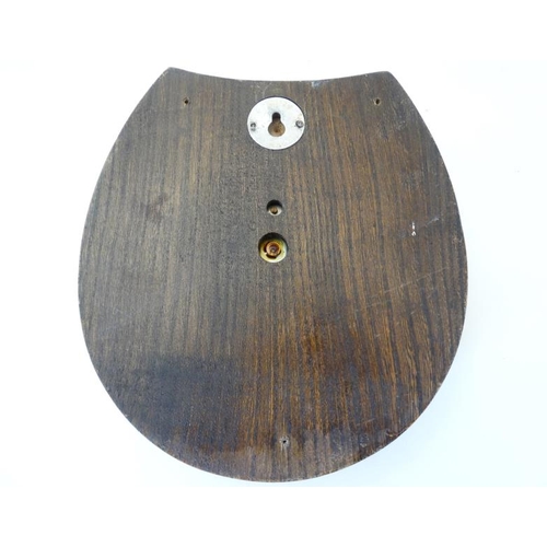 262 - Shortland Smith : a wall mounting   20 thC oak cased aneroid barometer with applied horseshoe decora... 