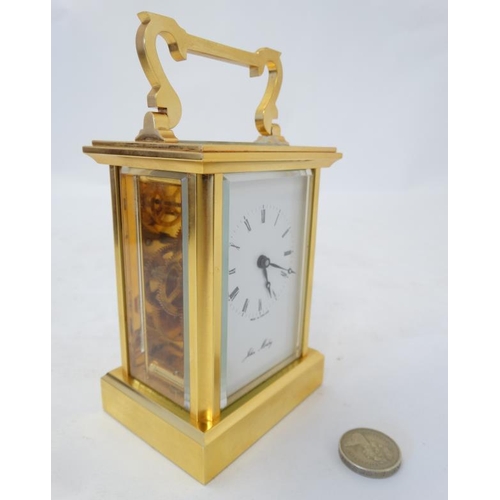 263 - John Morley Carriage Clock :a double cased gilt brass carriage clock ( timepiece ) , with 5 bevelled... 