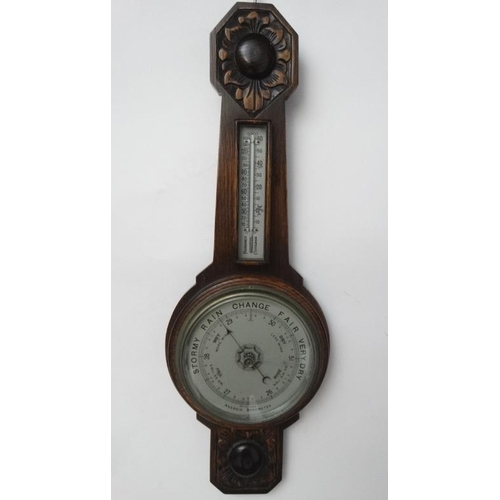 269 - Oak 2 glass wall Barometer : an aneroid barometer and Farenheit / Centrigrade thermometer with carvi... 