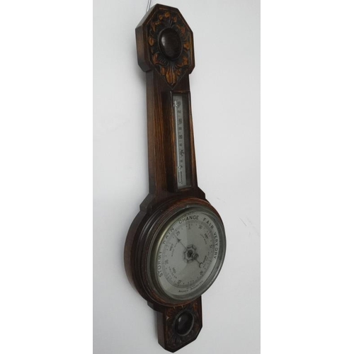 269 - Oak 2 glass wall Barometer : an aneroid barometer and Farenheit / Centrigrade thermometer with carvi... 