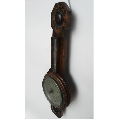 269 - Oak 2 glass wall Barometer : an aneroid barometer and Farenheit / Centrigrade thermometer with carvi... 