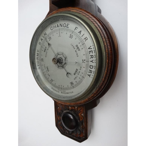 269 - Oak 2 glass wall Barometer : an aneroid barometer and Farenheit / Centrigrade thermometer with carvi... 