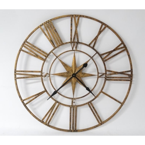 275 - Ossature Clock : a large gilt finished open battery powered wall / workshop clock , 42'' in diameter