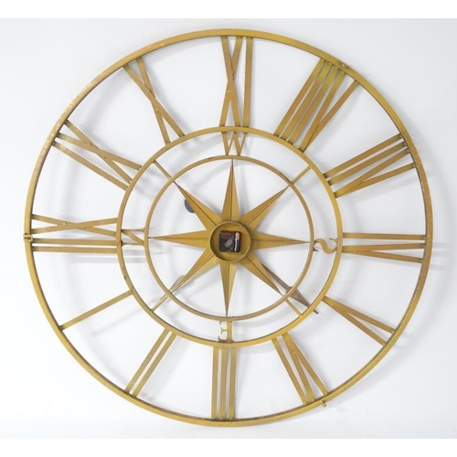 275 - Ossature Clock : a large gilt finished open battery powered wall / workshop clock , 42'' in diameter