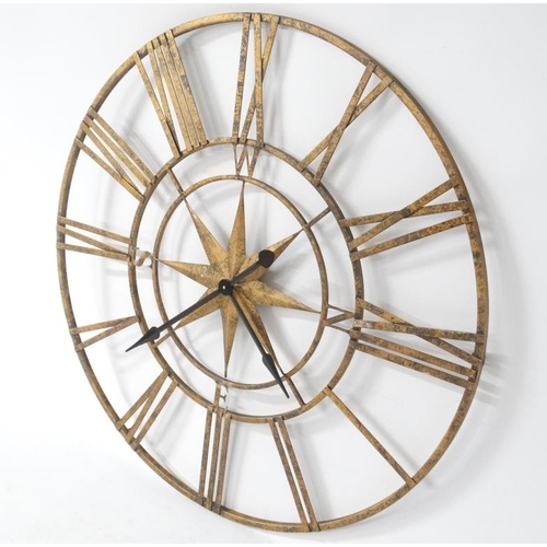 275 - Ossature Clock : a large gilt finished open battery powered wall / workshop clock , 42'' in diameter