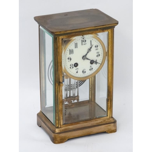 276 - Carriage Regulator clock : an 8 day, brass cased and bevelled glass ,4'' dial clock striking on a co... 