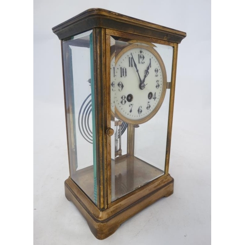 276 - Carriage Regulator clock : an 8 day, brass cased and bevelled glass ,4'' dial clock striking on a co... 