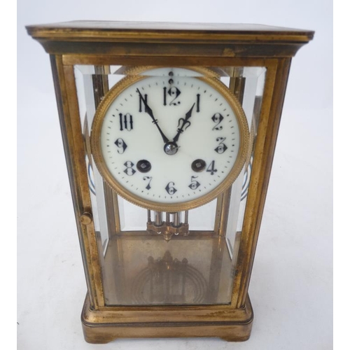 276 - Carriage Regulator clock : an 8 day, brass cased and bevelled glass ,4'' dial clock striking on a co... 