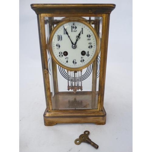 276 - Carriage Regulator clock : an 8 day, brass cased and bevelled glass ,4'' dial clock striking on a co... 