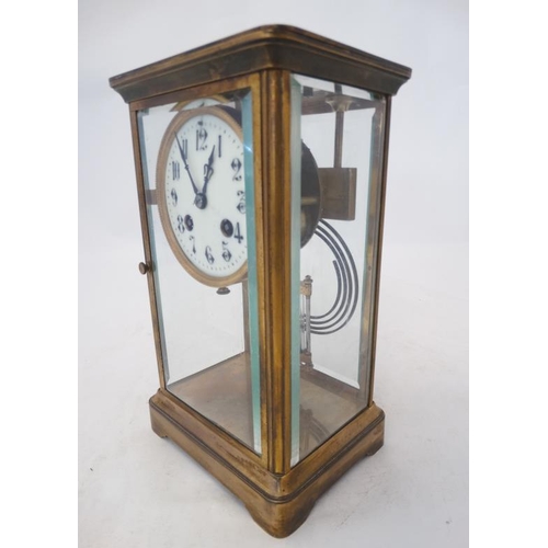 276 - Carriage Regulator clock : an 8 day, brass cased and bevelled glass ,4'' dial clock striking on a co... 