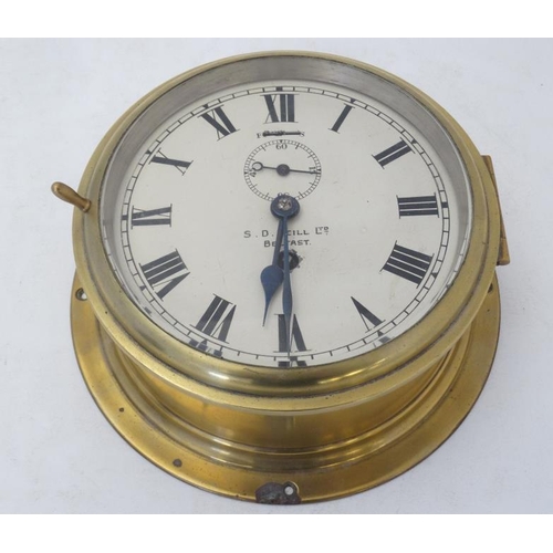 286 - Ship's Clock : ' SD Neill Ltd Belfast' brass cased 8 day Clock ( timepiece) with inset seconds dial,... 