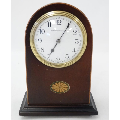 288 - Edwardian Mahogany Mantle Clock : an arched shaped cased Mahogany mantle clock ( timepiece ) with si... 