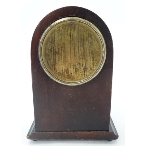 288 - Edwardian Mahogany Mantle Clock : an arched shaped cased Mahogany mantle clock ( timepiece ) with si... 