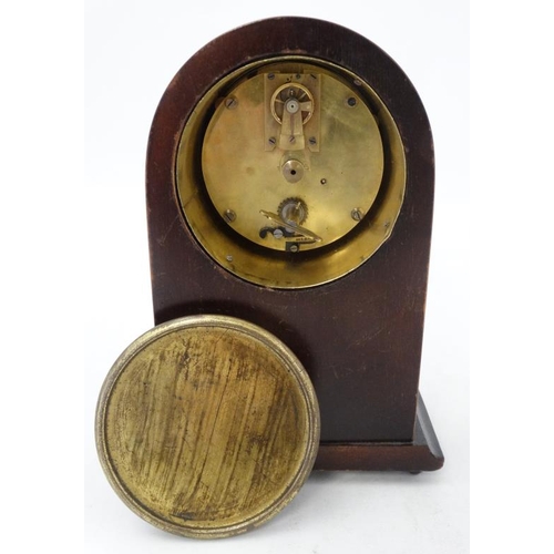 288 - Edwardian Mahogany Mantle Clock : an arched shaped cased Mahogany mantle clock ( timepiece ) with si... 