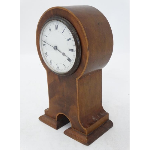 291 - Flame Mahogany mantle clock: an unusual shaped ' Keyhole ' shaped Flame mahogany cased clock ( timep... 