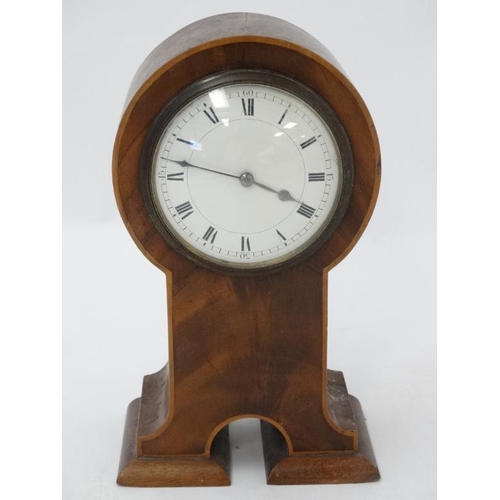 291 - Flame Mahogany mantle clock: an unusual shaped ' Keyhole ' shaped Flame mahogany cased clock ( timep... 