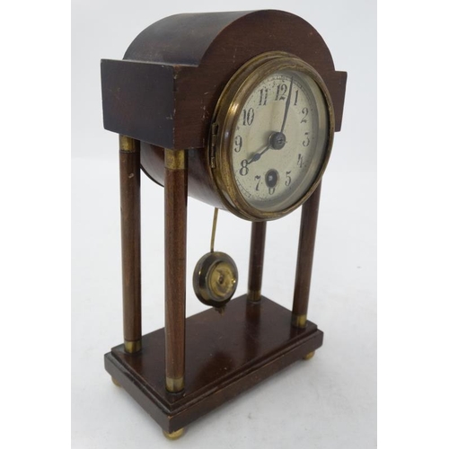 292 - Early- mid 20thC mahogany Portico Clock : the case with brass ended turned columns ,3'' silvered dia... 