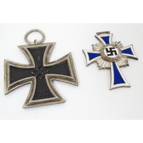 322 - Militaria : A collection of Third Reich items , to include a Cross of Honour of the German Mother ( ... 