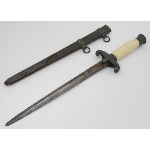 323 - Militaria : A WII Wehrmacht Officer's Dagger by WKC , Solingen , having a 9'' steel blade . The guar... 