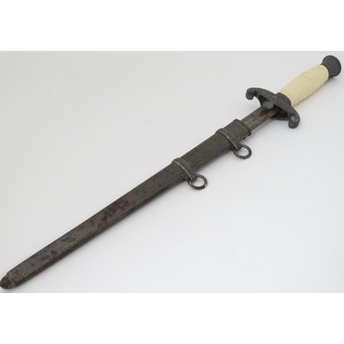 323 - Militaria : A WII Wehrmacht Officer's Dagger by WKC , Solingen , having a 9'' steel blade . The guar... 