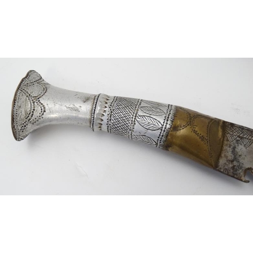 327 - Militaria : An early 20thC unusually large Nepalese Kukri knife , 22'' blade with a 5'' brass and wh... 